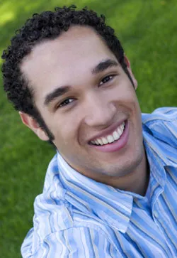 young man with beautiful smile, we accept major credit cards or CareCredit. Find out more about our financial options.